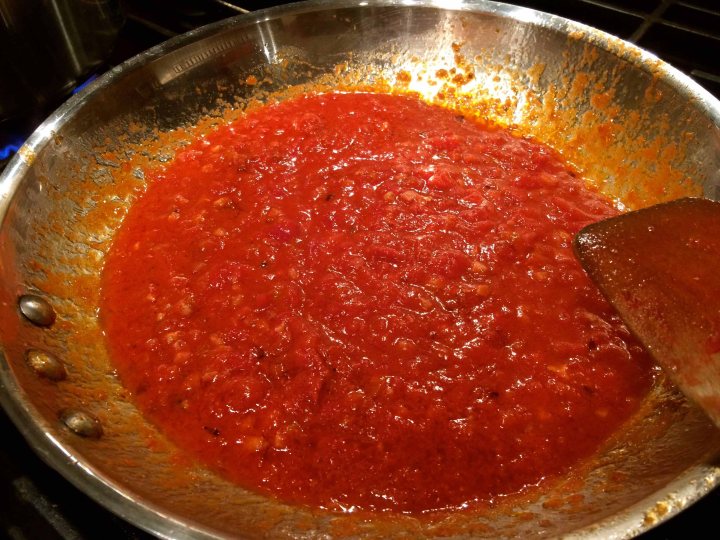 Simmering the tomato sauce